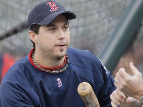 Josh Beckett got some tips on bunting during practice at Coors Field in Denver on Friday.