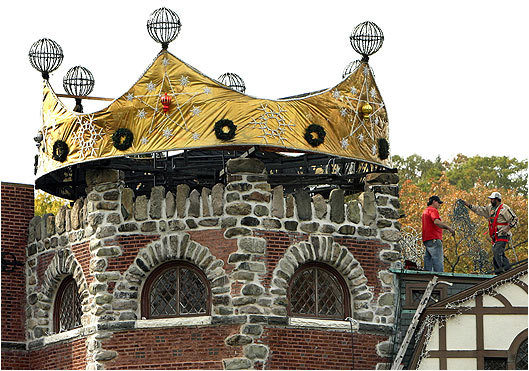 Luberto has constructed a 10-foot-high, 650-pound crown, which the city contends is a structure that requires a permit.