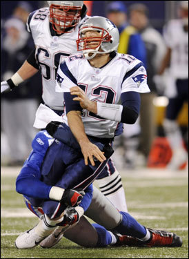 Tom Brady fired an incomplete pass while being pressured.