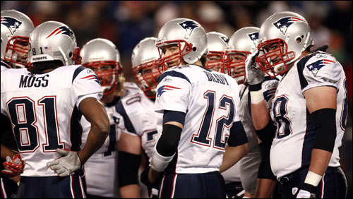 The Patriots offense huddled during the game.