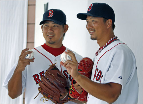 Japanese pitchers Daisuke Matsuzaka (left) and Hideki Okajima (right) posed together.