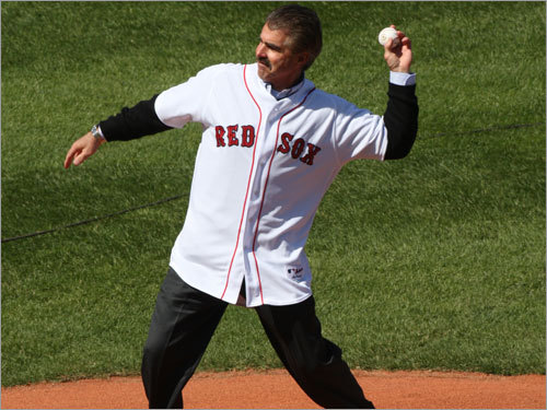 In an emotional return to Fenway Park, Bill Buckner threw out the first pitch at the Red Sox's home opener.