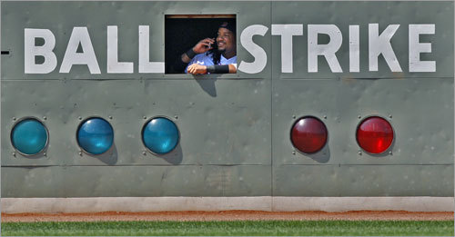 Sox slugger Manny Ramirez climbed into the Green Monster on Wednesday and could be seen talking on a cellphone during a pitching change. We asked you to tell us who you thought Manny might be talking to and how the conversation might have gone. Now, we've selected 10 faux calls and ask you to pick your favorite. Write your own caption