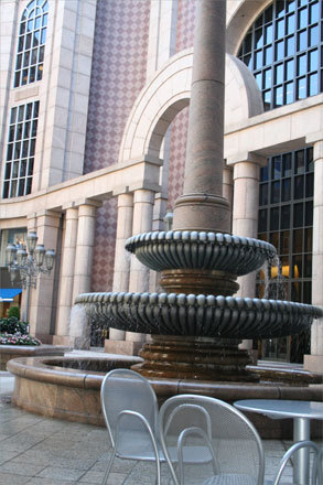 Some of the most exciting fountains of Boston are the hidden ones that surprise pedestrians when they hear the rush of water in an unexpected place. At left, one of two identical fountains shadowed by the 25-story office building at Five Hundred Boylston is just a few feet away from busy Boylston Street. The area gives workers a place to rest at tables and chairs that surround it.