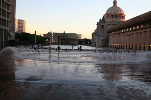 Even big kids enjoyed jumping around in water fountains to avoid the heat. The fountain by the reflecting pool at the Christian Science Center plaza, which is lit up at night, attracted some women passing by to go for a sunset dip.