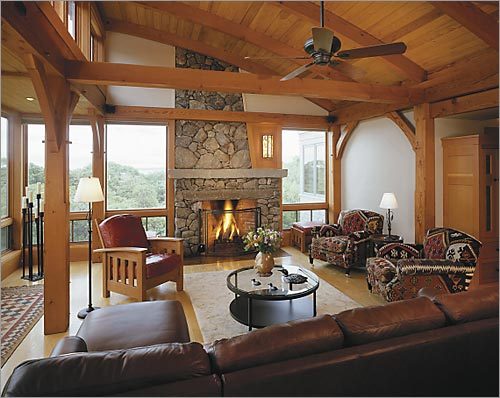 Living room with stone fireplace. (Photographs by Brian Vanden Brink)