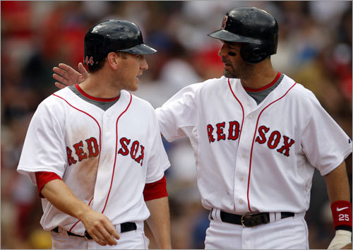 Jason Bay (left) and Mike Lowell helped power the Red Sox, to their third straight victory.