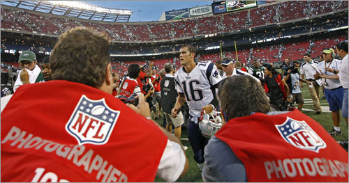 Patriots quarterback Matt Cassel finds himself in an unfamiliar position, namely being the center of attention as he heads for the locker room following New England's 19-10 victory over the Jets.