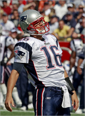 Patriots quarterback Matt Cassel reacts after getting sacked by Dolphins linebacker Joey Porter.