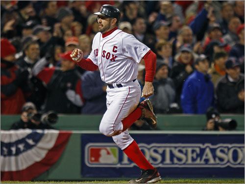 Red Sox captain Jason Varitek jogged to the plate after a wall ball double by Dustin Pedroia (not pictured) in the fifth inning.
