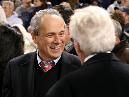 Red Sox president and CEO Larry Lucchino speaks with Peter Gammons during the postgame celebration.