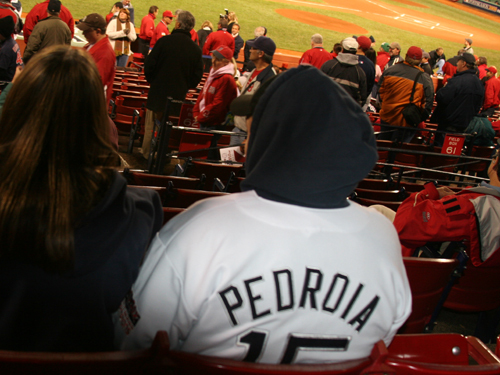 Shaun LaForce broke out his black-and-white Dustin Pedroia jersey with the hopes of helping Pedroia break his hitless streak in the ALDS. 'They've been pitching him away,' LaForce said.