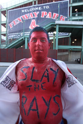 Jonathan Morse of Easton shows off his paint job outside of Fenway before the game.