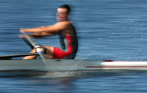Just a blur as he raced down the river, Sam McVeety, from St. Paul, Minn. who is with the MIT Boat Club, placed 44th in the Club Men's Singles.