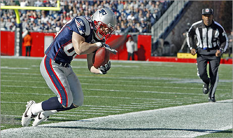 Patriots wide receiver Wes Welker kept his feet in bounds as he hauls in a 21-yard first quarter pass for a first down. Two plays later, Cassel ran it in from 13 yards out for the first touchdown of the game.