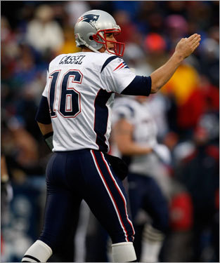 Patriots quarterback Matt Cassel signaled for a first down against the Bills.