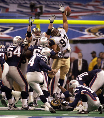 2002: Patriots 20, Rams 17 On the professional sports side, the New England Patriots shocked the heavily favored St. Louis Rams in Super Bowl XXXVI when Adam Vinatieri kicked a 48-yard field goal as time expired. St. Louis tied the game with 1:30 left, but MVP Tom Brady connected with Troy Brown to help set up the winning field goal as the Pats moved 53 yards with no timeouts. 2002: Patriots 20, Rams 17 On the professional sports side, the New England Patriots shocked the heavily favored St. Louis Rams in Super Bowl XXXVI when Adam Vinatieri kicked a 48-yard field goal as time expired. St. Louis tied the game with 1:30 left, but MVP Tom Brady connected with Troy Brown to help set up the winning field goal as the Pats moved 53 yards with no timeouts.