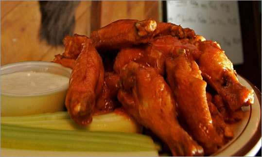 Sure, you could hop a flight to Buffalo for a taste of the original. But the fact of the matter is, since the Anchor Bar created the Buffalo wing in 1964, the recipe has seen enough variation and improvement that the only real way to determine the best Buffalo wing out there is via subjective methods. Maybe you're a boneless kind of person. Or perhaps you like the wings breaded just a bit. To each his or her own. In New England, there are plenty to choose from. Here are some of the best.