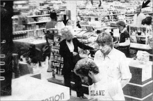 Investigators determined the lethal doses of cyanide must have been carefully inserted into Tylenol pills after they had been on stores' shelves. This 1982 surveillance video still, released by Chicago police, allegedly shows a man they believe was Lewis (arrow, top right) looking at Paula Prince (arrow, center) in a drugstore on the night she died from poisoned Tylenol capsules. Prince,35, was a mother of four.