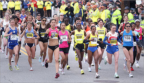 US Olympian Kara Goucher, shown at left in pink and black, competed this year, along with fellow US Olympians Brian Sell and Elva Dryer, bringing more elite runners to Boston than in recent years.