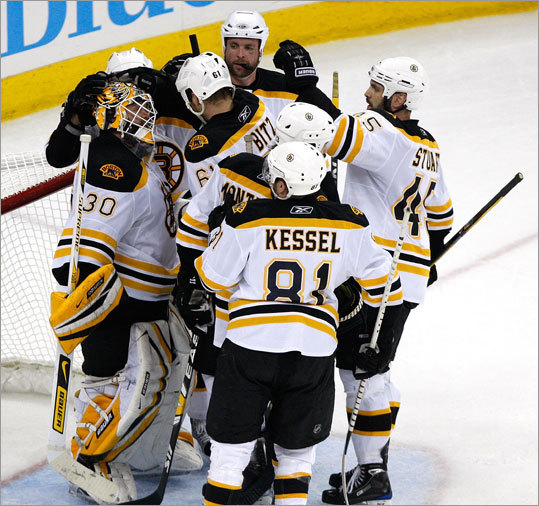 The Bruins celebrate around goaltender Tim Thomas after defeated the Carolina Hurricanes, 4-2, in Game 6 of the Eastern Conference semifinal series in Raleigh. With the win, Boston evened the best-of-seven series at 3 games apiece and forced a decisive Game 7 Thursday in Boston. Stroll through our gallery for more scenes from Game 6.