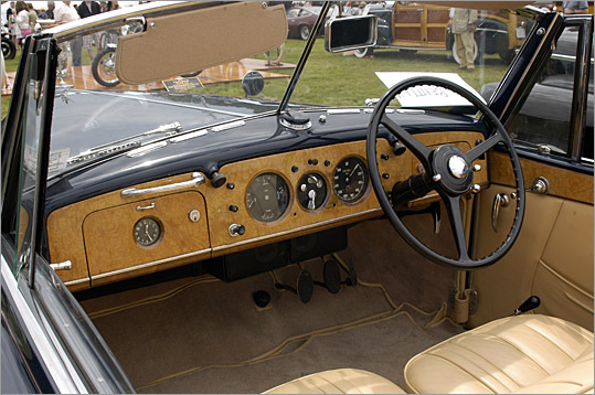 Rich burl covers the dash of this 1950 Bentley.