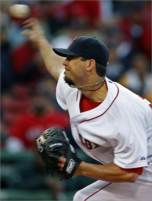 Josh Beckett oppressed the A’s for 6 2/3 innings, allowing six hits and a walk and striking out four on his way to his 10th victory, tied for tops in the American League. Take a look at the game photos of this Fenway Park win for the Sox.