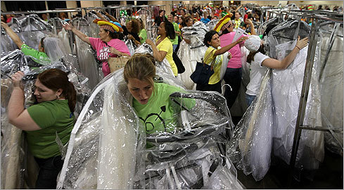 A vast sea of wedding-crazy humanity picks the racks clean. There will be no mercy.