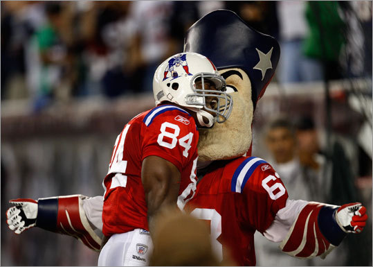 Benjamin Watson shows Pat Patriot a little love after scoring his second of two touchdowns in the closing minutes.