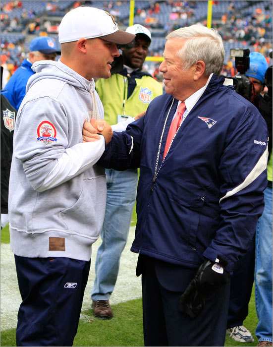 Josh McDaniels also spoke with Patriots owner Robert Kraft (right) before the game.