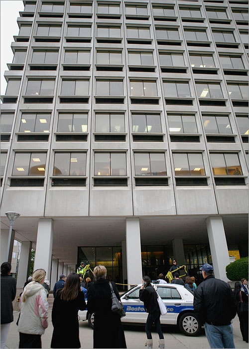 Dr. Astrid Desrosiers, a Massachusetts General Hospital psychiatrist who worked at the center, was stabbed by patient Jay Carciero, 37, of Reading. Langone, who was off duty at the time, entered the office where the doctor was stabbed, ordered Carciero to drop the knife, and when he did not, shot Carciero three times, according to a law enforcement source. (Pictured) people gathered outside the clinic building as officers responded to the incident. Read more: Patient stabs doctor before being shot by security guard at Mass. General