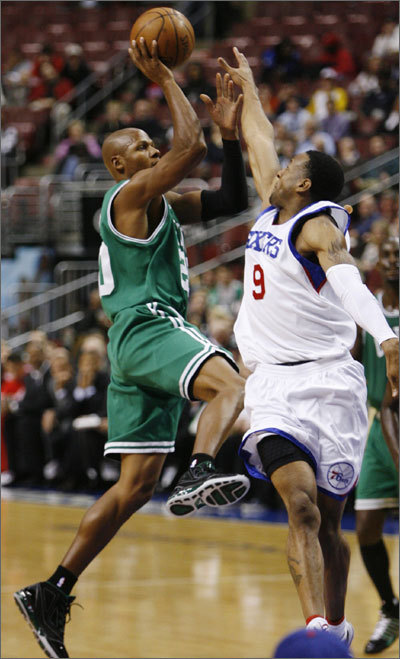 Ray Allen shot over the outstretched arms of Andre Iguodala in the first quarter. Allen finished with just five points, but the Celtics defeated the 76ers 105-74 Tuesday in Philadelphia.
