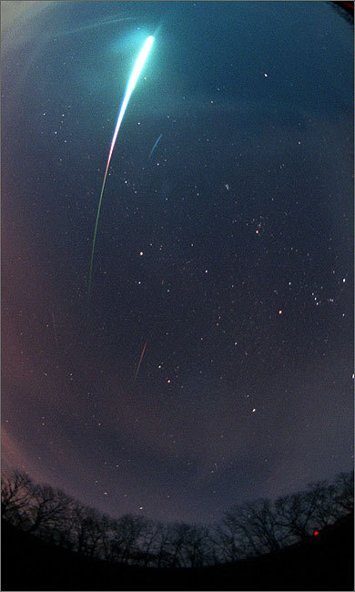 Cropped from an 8mm All-Sky photograph, a Leonid meteor streaked over Louisburg, Kan., on Nov. 17, 1998.