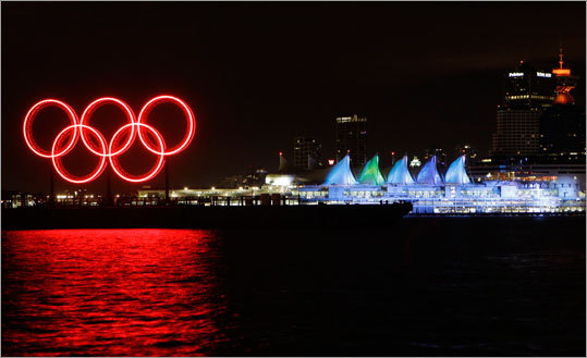 The skyline of downtown Vancouver was illuminated by a glowing Olympics rings in the early morning hours Friday, the first day of the 2010 Winter Olympics. The Opening Ceremonies begin at 7:30 p.m.