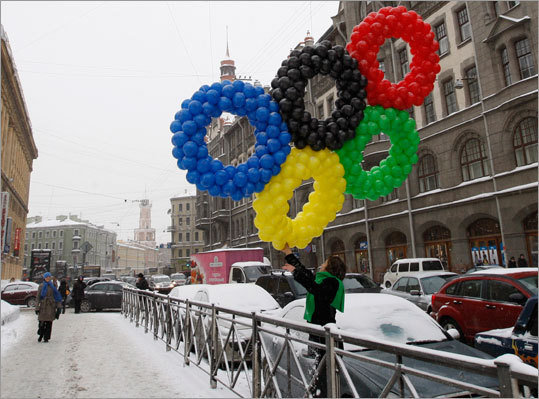 The Olympics will be closely watched in Russia because that is where the next Winter Olympics will be held, in 2014. In St. Petersburg, the streets were decorated to help promote the Olympic spirit.