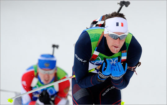 The men's biathlon was one of Sunday's featured events. Here, Vincent Jay of France is seen on his way to winning the gold medal of the men's biathlon 10 km sprint event