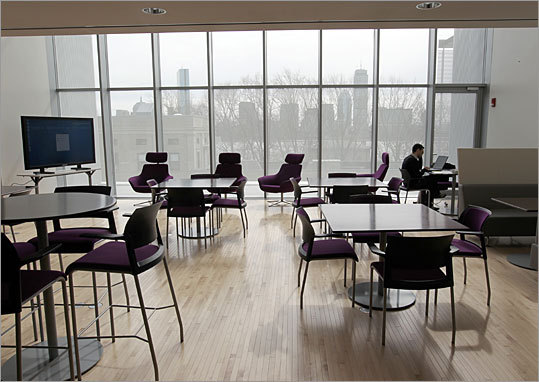 This Media Lab room has a view of Boston. Moss said the building's large central atrium and glass-enclosed laboratories are ideal spaces for the lab's collaborative research projects.