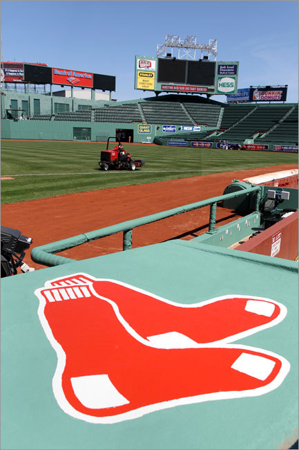 A grounds keeper made sure the grass was just right Friday, as preparations were underway for the season opener against the Yankees.