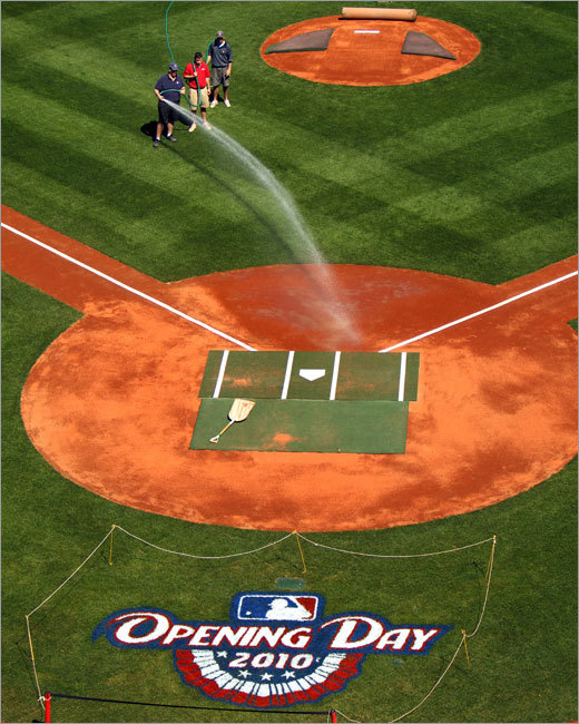 Fenway Park's ground crew made preparations Saturday, wetting the dirt at homeplate.