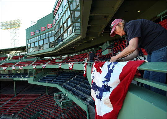 Carol Batchelder from Alden Flag hung bunting from the facade on the upper level of the park.