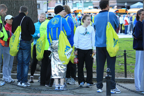All runners had their bib numbers ready to show to board a bus. Most runners showed up with their complimentary neon Adidas bag.