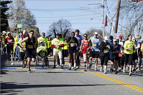 The mobility impaired race starts in Hopkinton. They are the first competitors to begin the Boston Marathon.