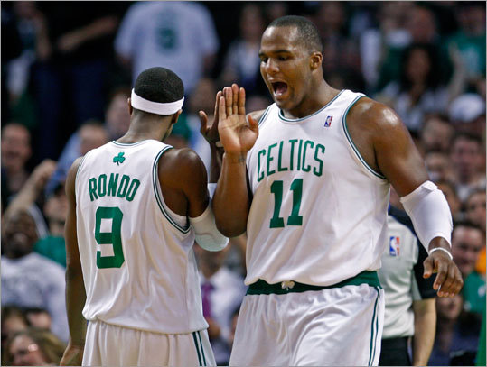 Glen Davis (right) had seven points for the Celtics. His basket in the fourth quarter met with the approval of teammate Rajon Rondo.