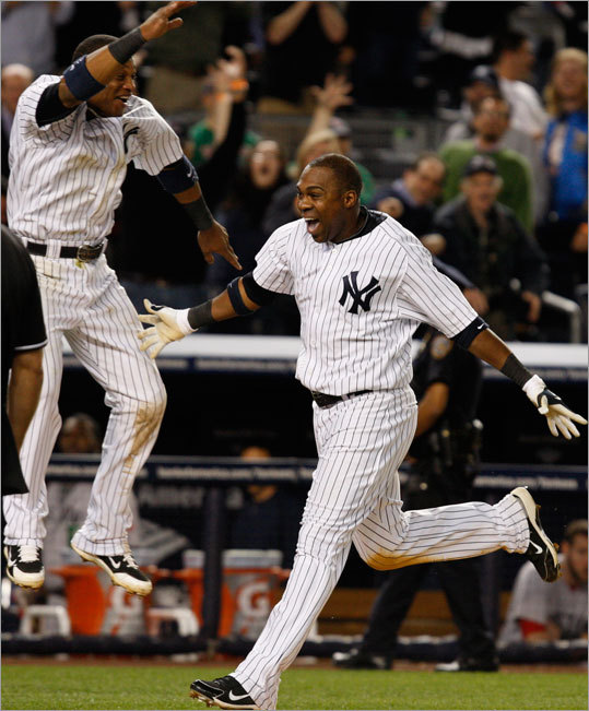 Marcus Thames (right) hit a walkoff home run in the ninth inning to lift the Yankees to an 11-9 victory over the Red Sox Monday at Yankee Stadium. The Red Sox trailed much of the game, but rallied to take a 9-7 lead in the eighth. Then the Yankees tied the score in the ninth on Alex Rodriguez's two-run home run, setting up Thames' heroics.