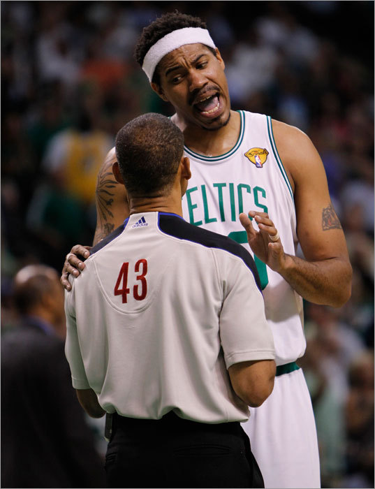 The Celtics' Rasheed Wallace discussed the game with referee Dan Crawford in the second half.