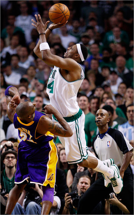 Celtics forward Paul Pierce (right) shot over Kobe Bryant in the fourth quarter for two of his 27 points.