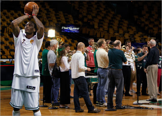 The Celtics' Marquis Daniels worked on his free throws as members of the Boston Pops worked on their rendition of the national anthem before Game 5 of the NBA Finals at TD Garden.