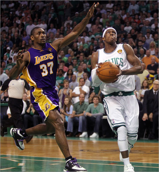 Celtics guard Rajon Rondo (right) breezed past Ron Artest and scored on a layup with 38.9 seconds left in the game. Forward Paul Pierce started the play with a pass to Rondo.