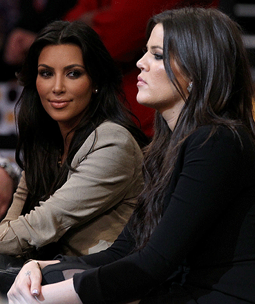 Kim and Khloe Kardashian were courtside.