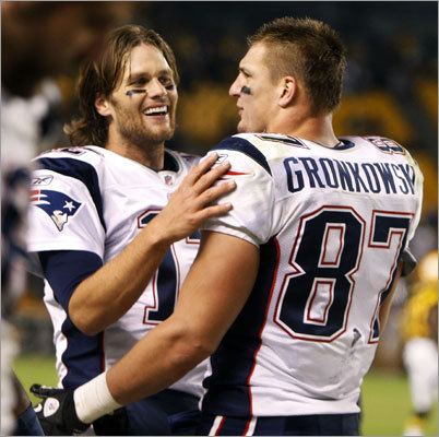 Quarterback Tom Brady (left) hooked up with tight end Rob Gronkowski on three touchdown passes as the Patriots defeated the Steelers 39-26 Sunday at Heinz Field in Pittsburgh.